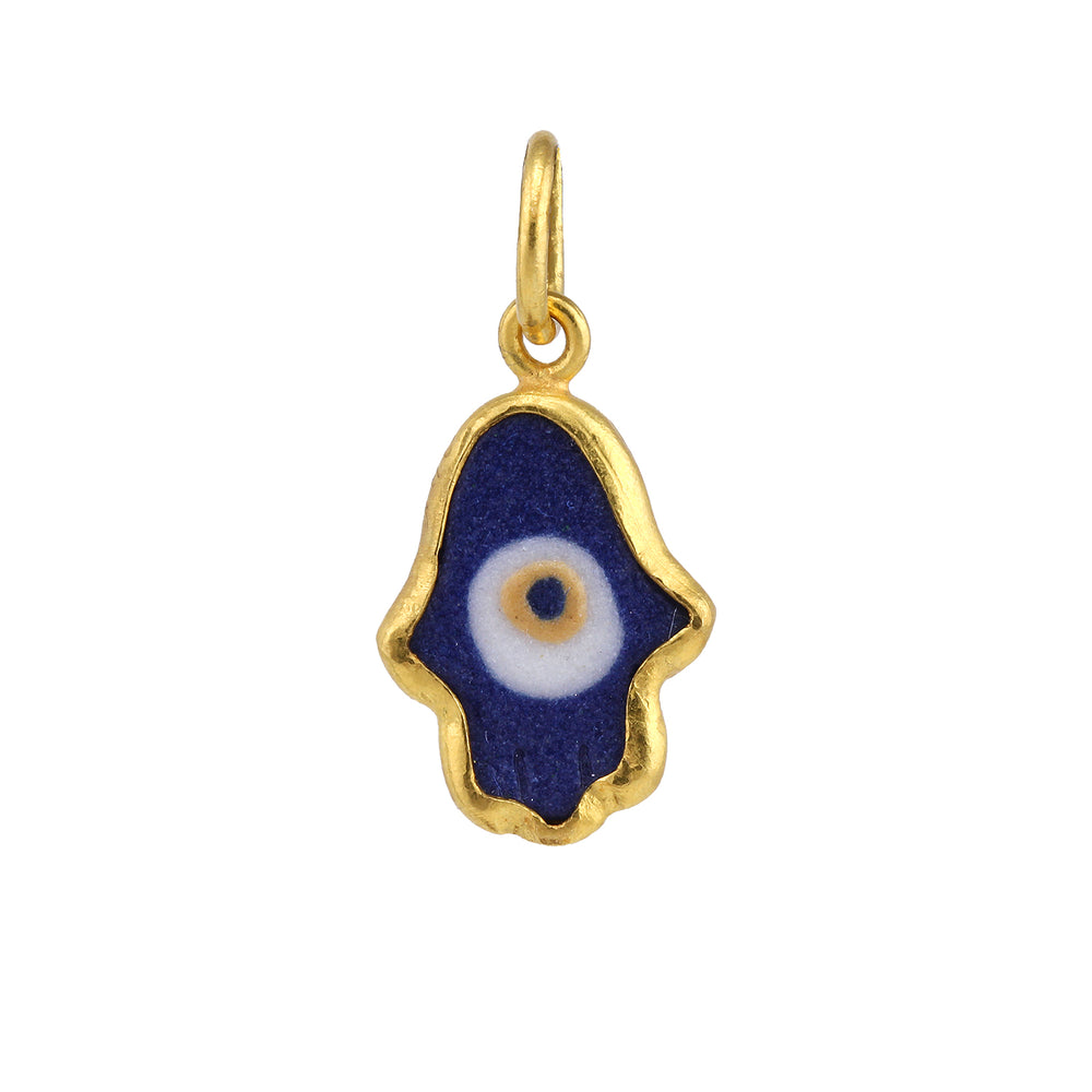 Front-facing view of Evil Eye Hamsa Charm by Prehistoric Works.