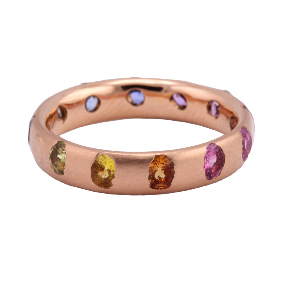 Angled front-side view of Rose Gold Rainbow Narrow Celeste Ring by Polly Wales
