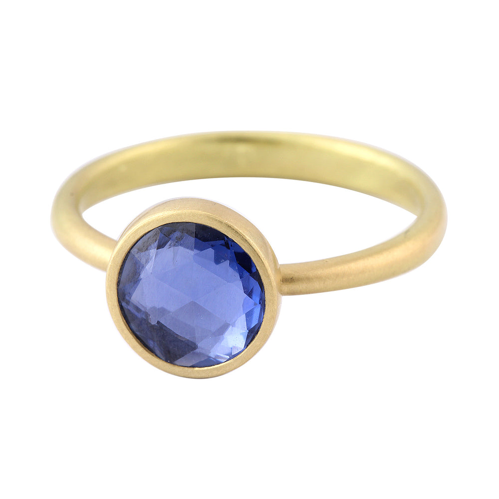 Angled view of Round Blue Sapphire Ring by Lola Brooks