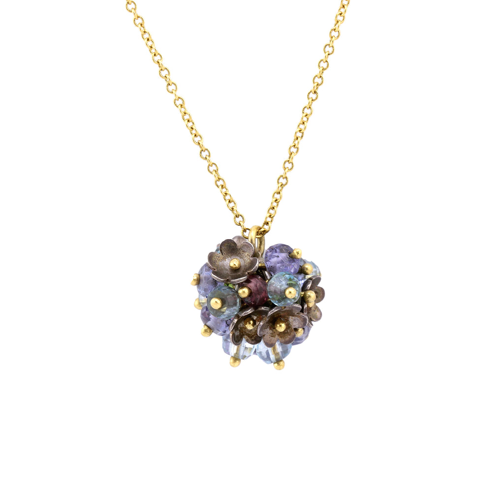 Detail view of Gemball Necklace with Peridot, Sapphire, Amethyst, and Aquamarine by Stephen Dove.