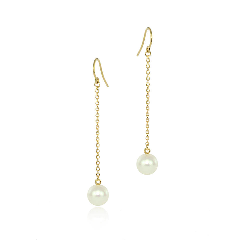 Front-facing view of Small Pearl Drop Earrings by Andrea Blais.