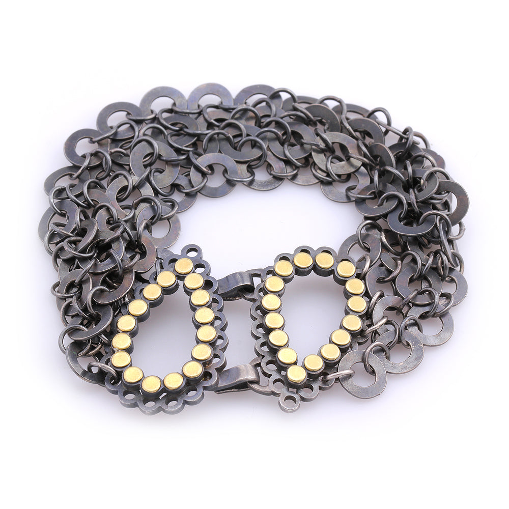 Angled view of Teardrop Dot Bracelet with Circle Chain by Elisa Bongfeldt.