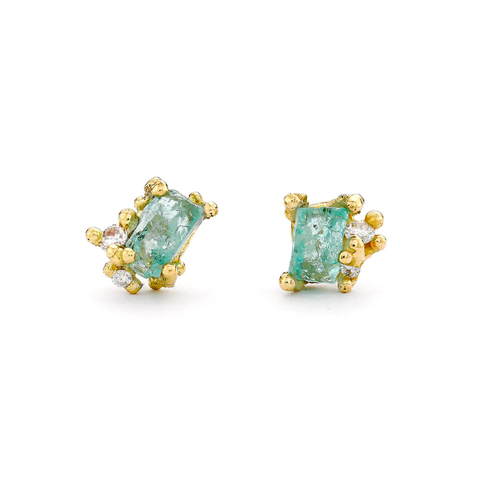 Front-facing view of Raw Emerald and Diamond Encrusted Stud Earrings by Ruth Tomlinson
