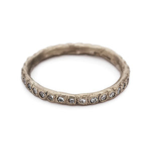 Angled view of 18k White Gold Diamond Eternity Band by Ruth Tomlinson