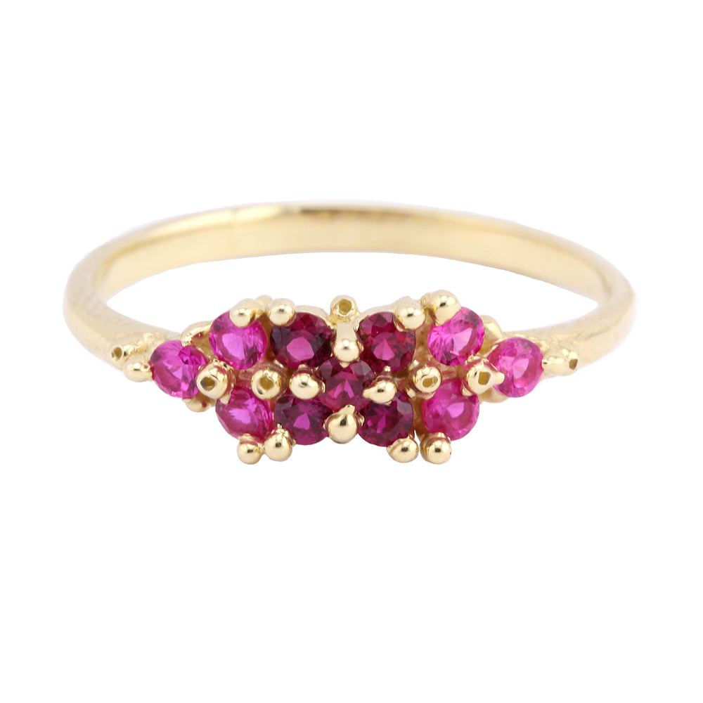 Front-facing view of Trandafir Ring with pink sapphires by Ruta Reifen