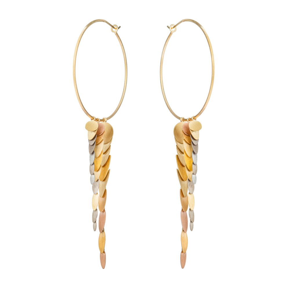 Angled view of Dancing Trail Earrings by Sia Taylor.
