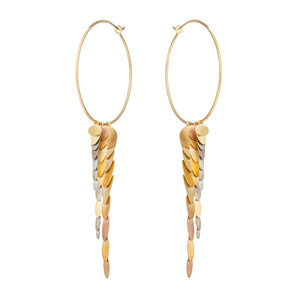 Angled view of Dancing Trail Earrings by Sia Taylor.
