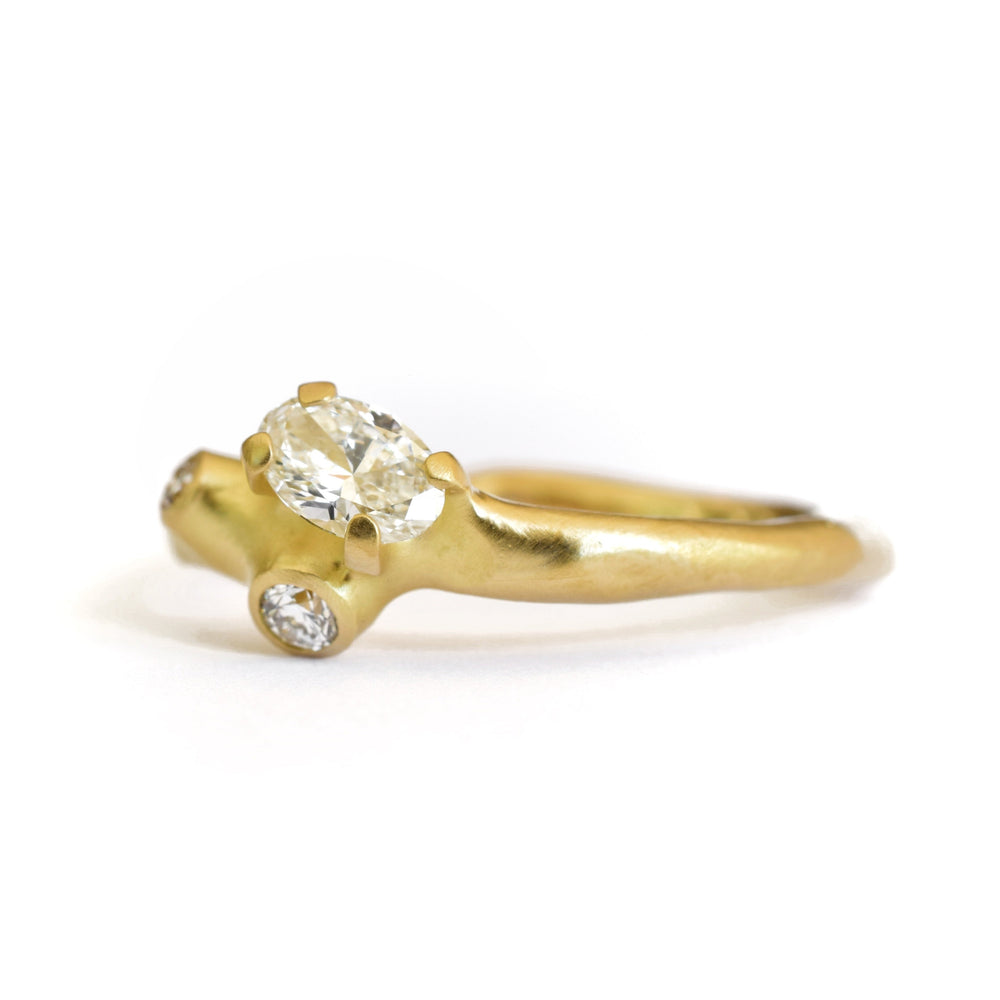 Angled view of Medium Barnacle Cluster Ring with Oval Diamond by Johnny Ninos