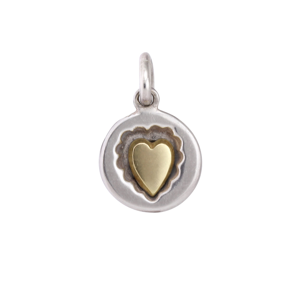 Front-facing view of Cookie Cutter Heart Charm by Betsy Barron.