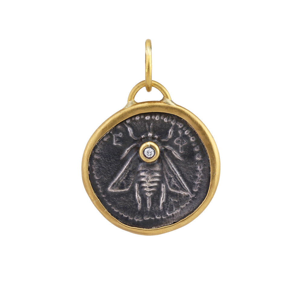 Front-facing view of Bee Epehsus Coin Charm by Prehistoric Works.