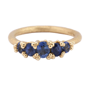 Front-facing view of Five Stone Ring with Granules by Ruth Tominson