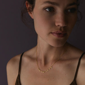 Model wearing Tiny Dots Double Chain Necklace by Sia Taylor