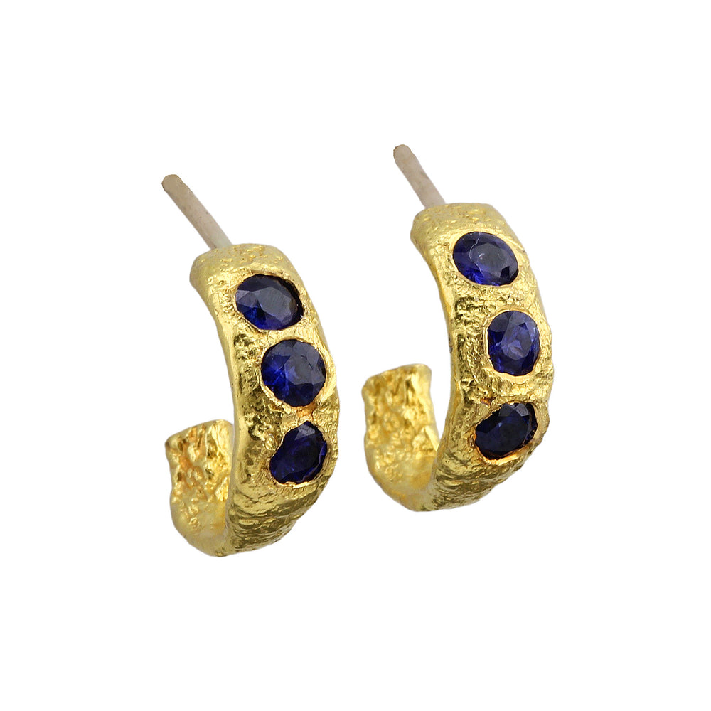 Angled view of Small Molten Hoop earrings with sapphires by Betsy Barron Jewellery