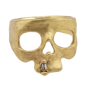 Angled view of Snaggletooth Skull Pinky Ring by Polly Wales
