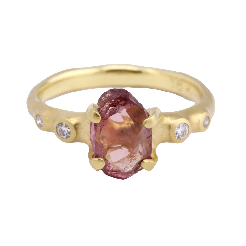 Front-facing view of Rough Luxe Mahenge Garnet Ring by Johnny Ninos.