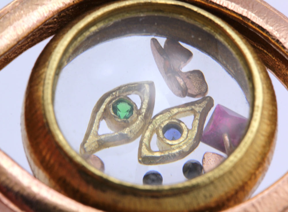 
            
                Load image into Gallery viewer, Close-up detail view of Spinning Monocle Pendant by James Banks
            
        