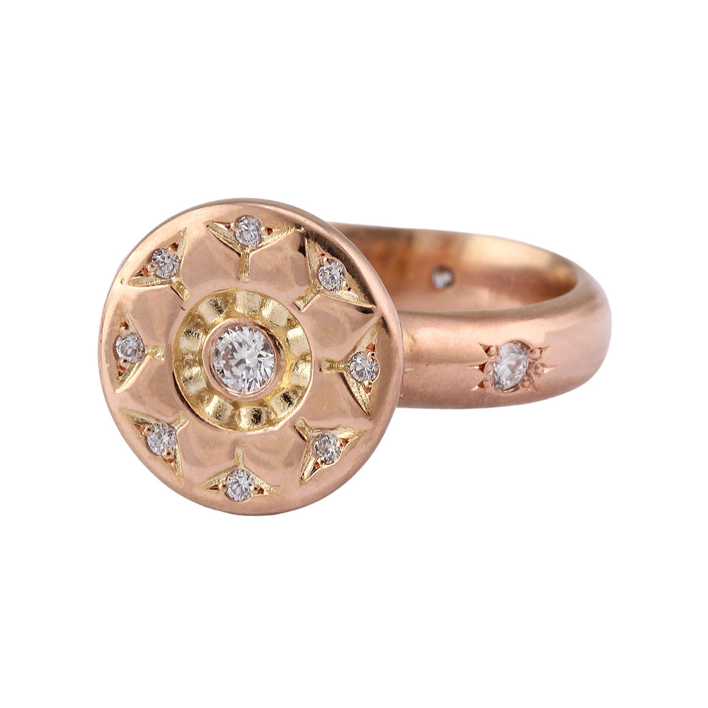 Angled view of ancient Flower Ring by Betsy Barron Jewellery in 18k Rose Gold with white diamonds.