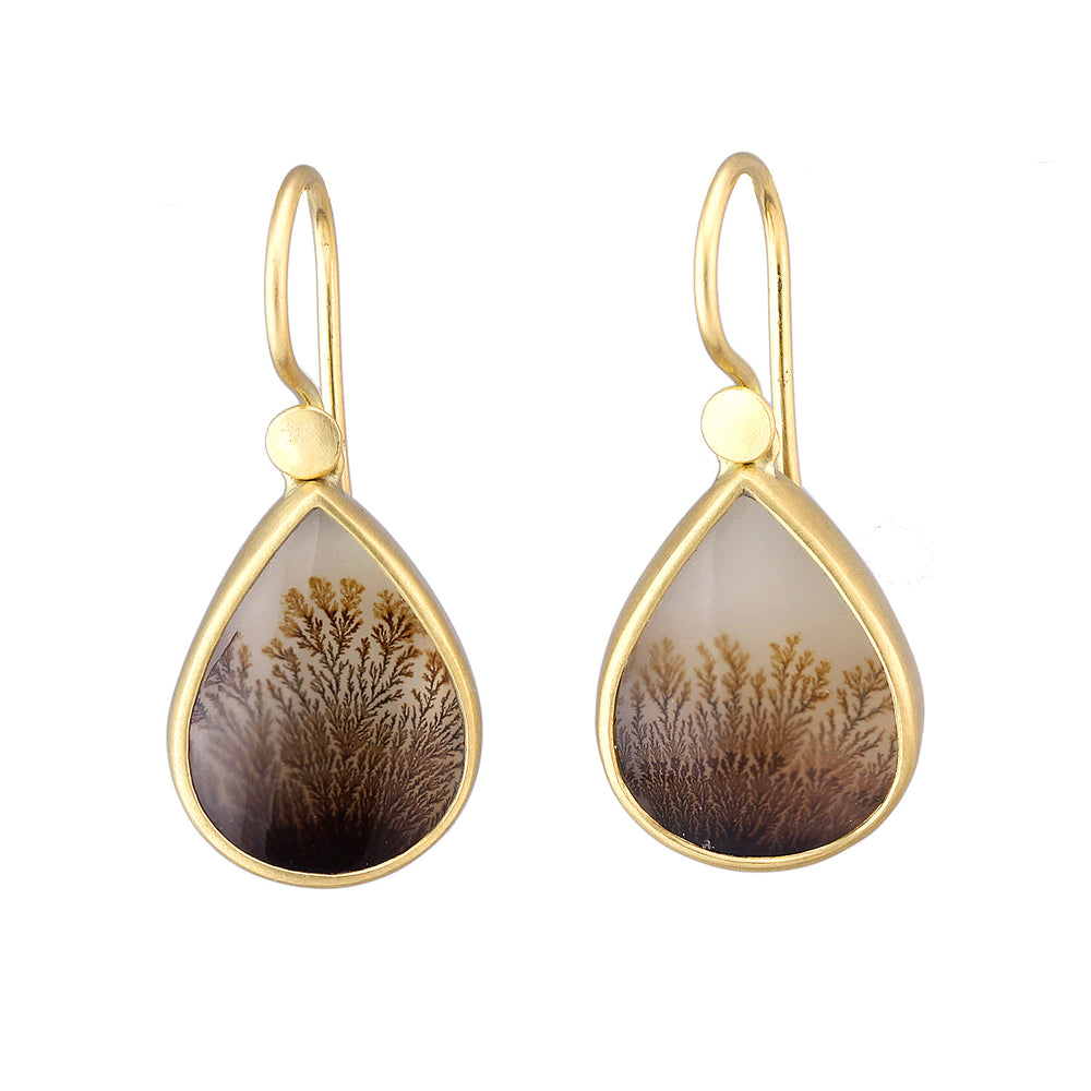 Angled view of Small Dendritic Agate Teardrop Earrings by Lola Brooks