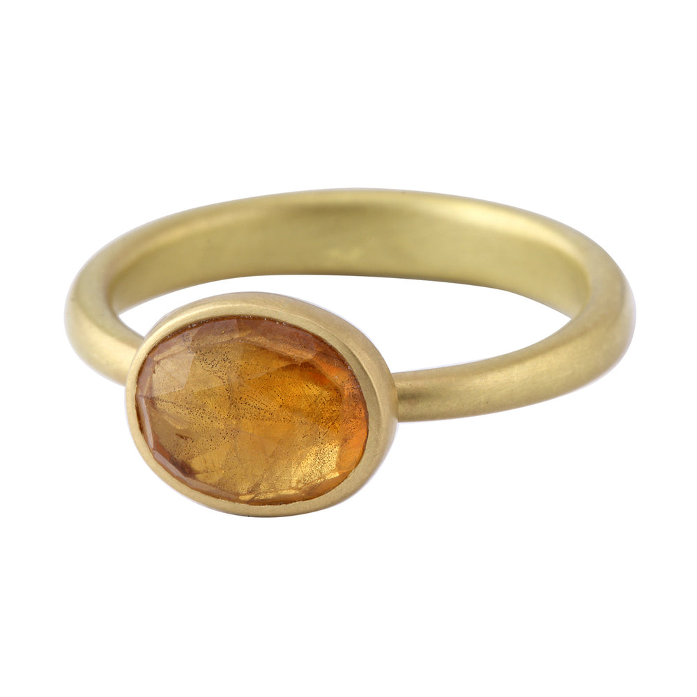Angled view of Saffron Umbra Sapphire East-West Oval Ring by Lola Brooks