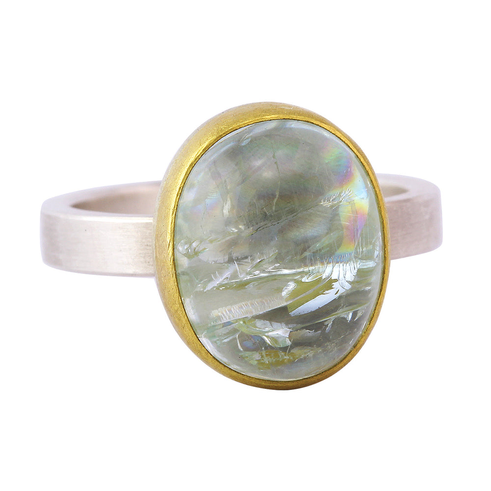 
            
                Load image into Gallery viewer, Angled view of Oval Aquamarine Cabochon Ring by Sam Woehrmann.
            
        