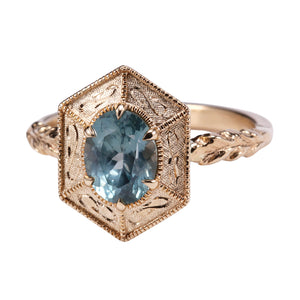 Angled front-facing view of Unheated Montana Oval Sapphire Ring by The North Way Studio