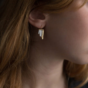 Detail view of model wearing Tiny Rainfall Earrings by Sia Taylor