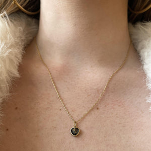 Detail view of model wearing Black Diamond Sweetheart Necklace by Lola Brooks