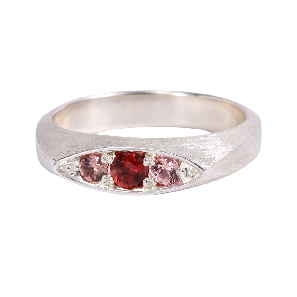 Front-facing view of Remy ring in sterling silver with hot pink spinel center and pink sapphire side stones by Betsy Barron