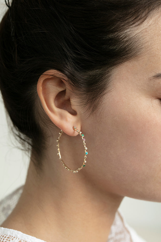 Detail view of model wearing Khano Earrings by 5 Octobre