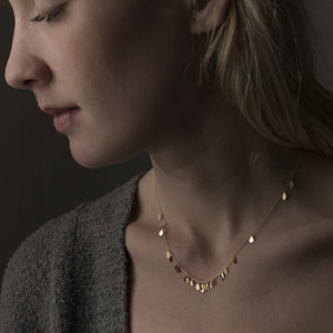 Model wearing Raindrops Necklace by Sia Taylor