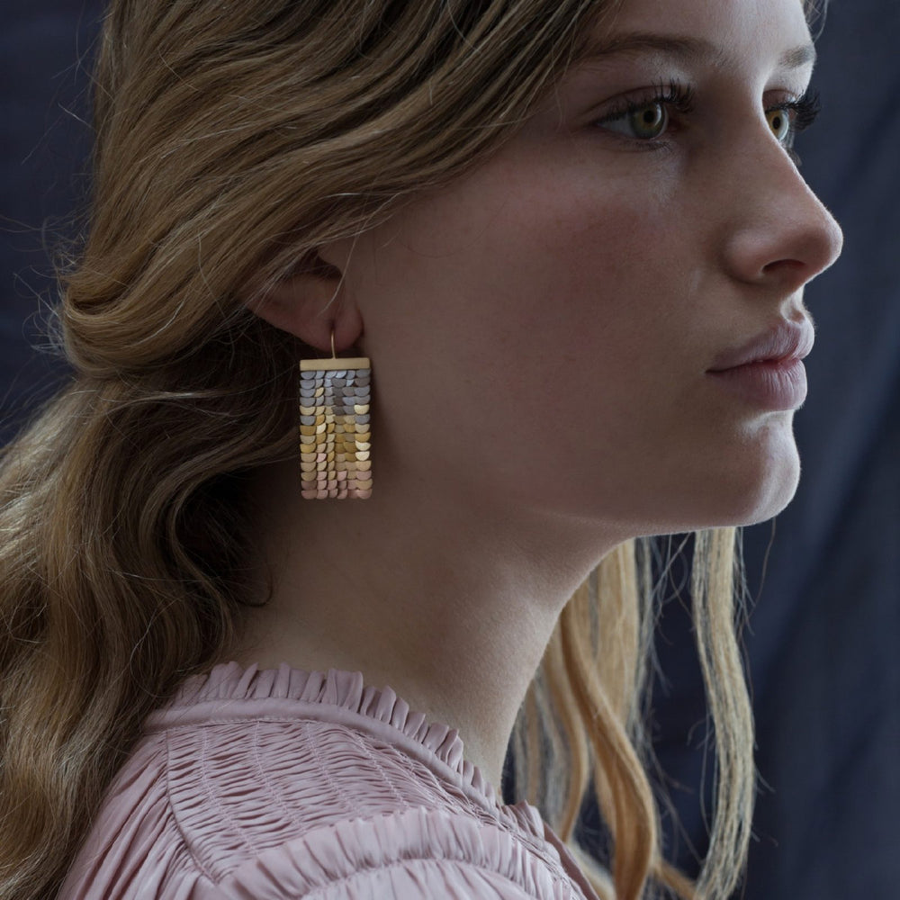 Model wearing Rainbow Sunrise Earrings by Sia Taylor