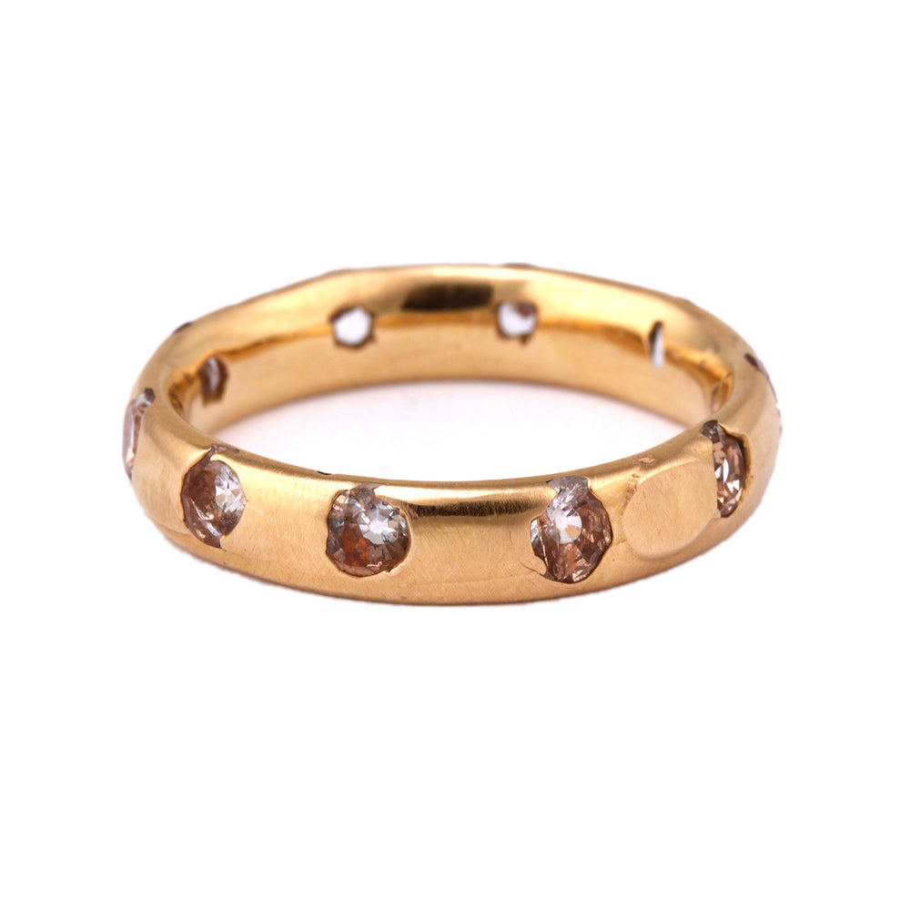 Front-facing view of Narrow Celeste Band in 18k Rose Gold with White Sapphires by Polly Wales.