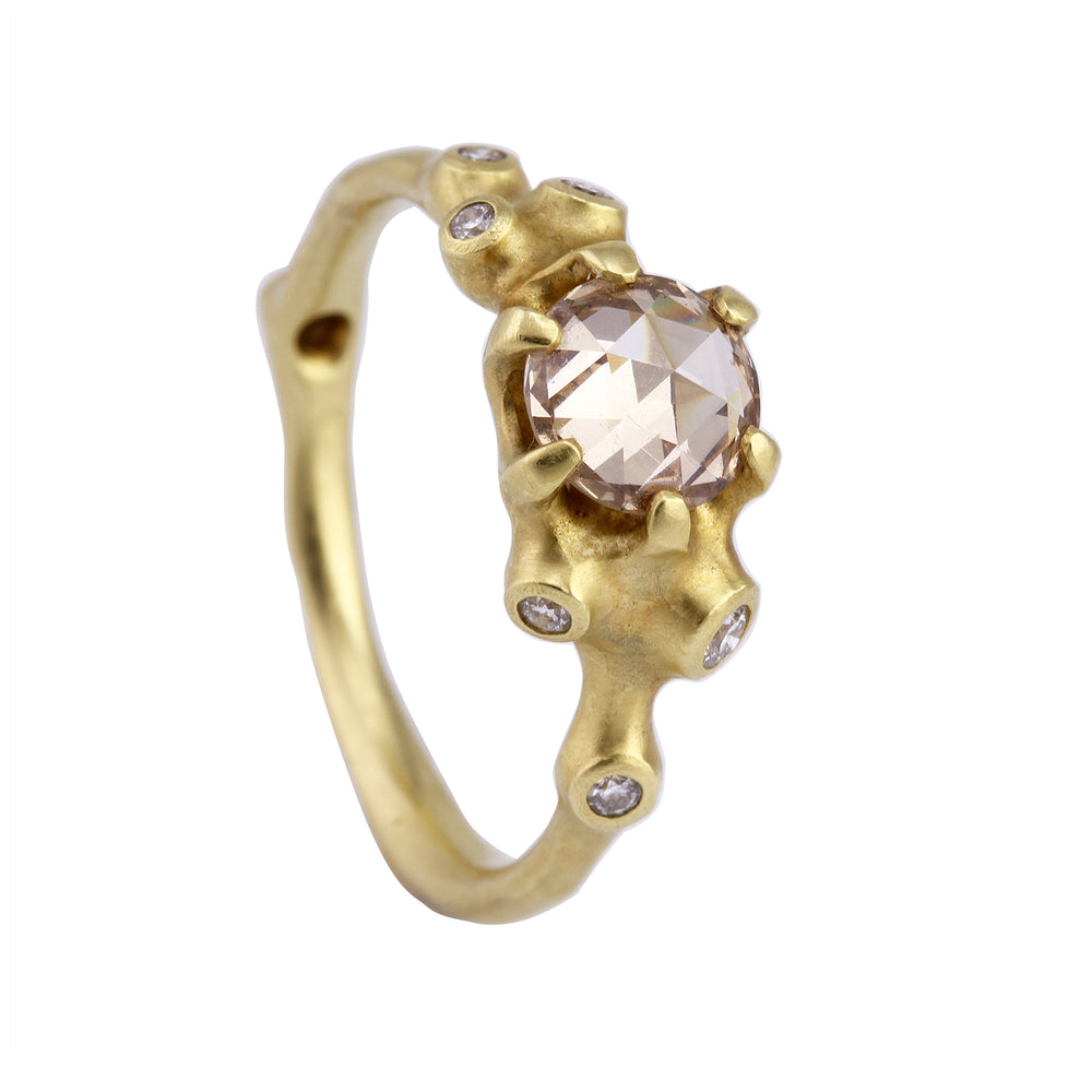 Angled view of Champagne Diamond Cluster Ring with White Diamond Melee by Johnny Ninos