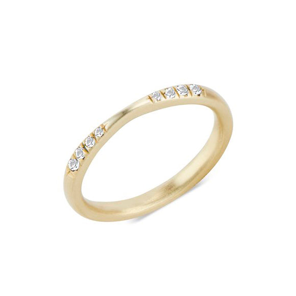 Angled view of Exie Ring in 10k yellow gold with 8 white diamonds.