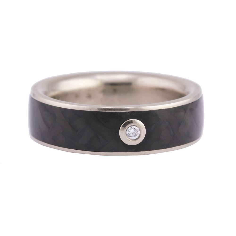 Front-facing view of 18k Palladium White Gold and Carbon Fiber Ring by Diana Hall