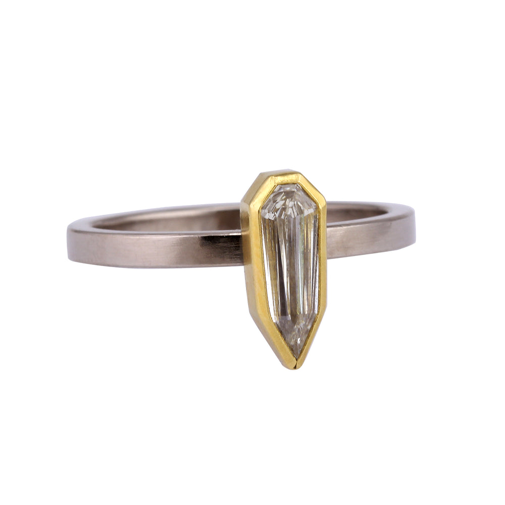 Angled view of elongated diamond shield ring by Sam Woehrmann