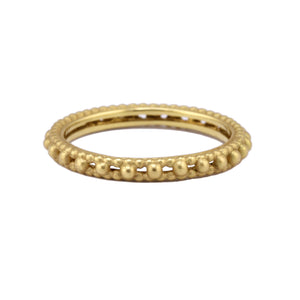 Angled view of Rapunzel Band in 18k Yellow Gold by Polly Wales