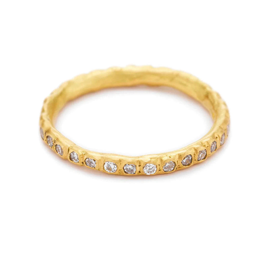 Angled view of 18k Yellow Gold White Diamond Eternity Band by Ruth Tomlinson.
