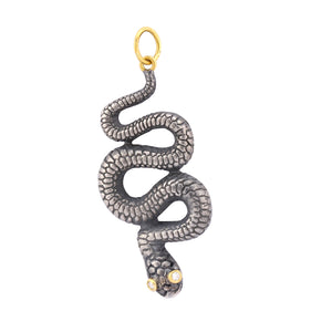 Front-facing view of Large Snake Charm by Prehistoric Wolrks.