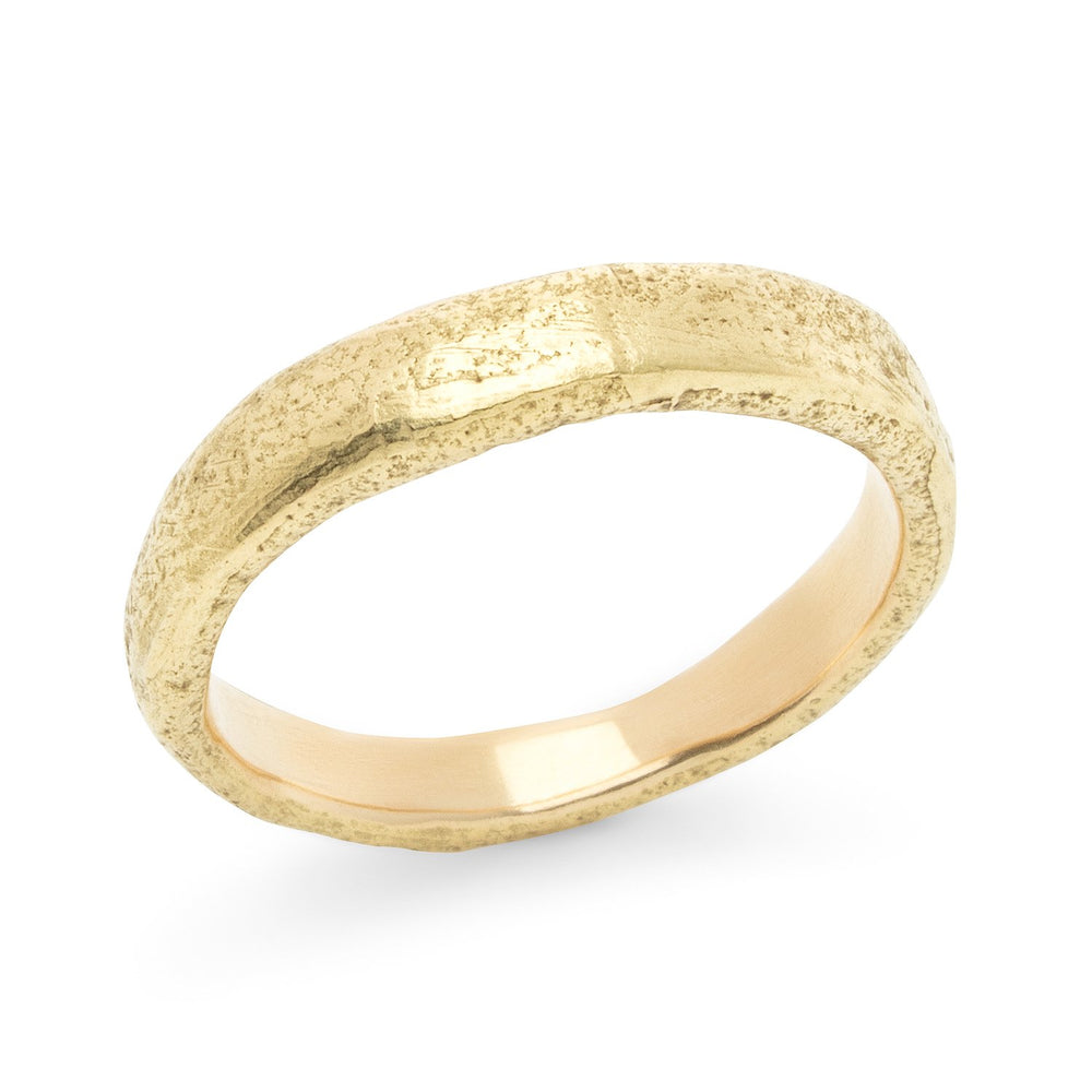 Angled-view of Narrow Molten Band in 14k yellow gold by Betsy Barron