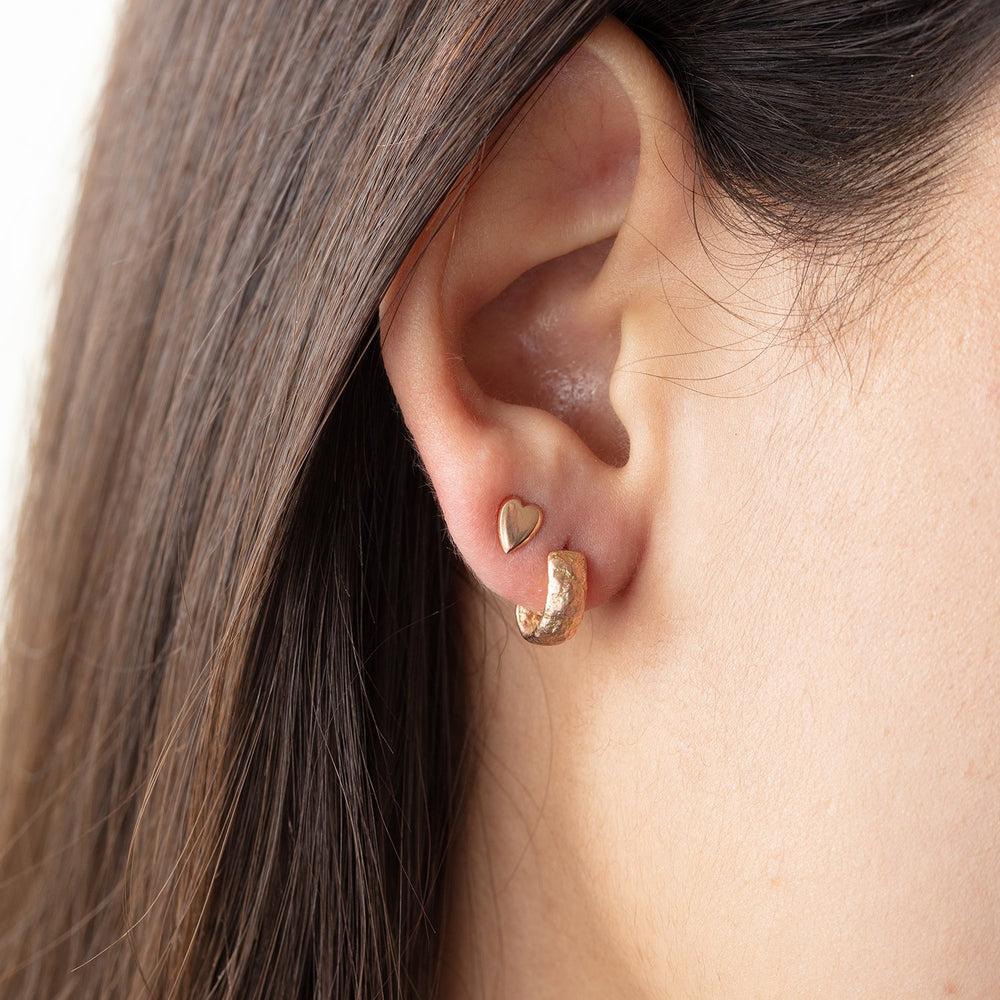 Model wearing Small Molten Hoop earring by Betsy Barron Jewellery on right ear