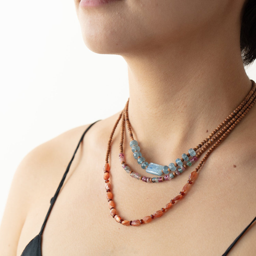 Model wearing Vacation Necklaces by Betsy Barron Jewellery