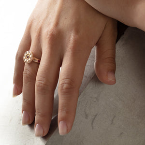 
            
                Load image into Gallery viewer, Ancient Flower Ring by Betsy Barron on model&amp;#39;s hand.
            
        