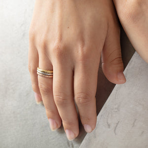 
            
                Load image into Gallery viewer, Stacked set of 3 Lu Bands by Betsy Barron, worn on model&amp;#39;s right hand.
            
        