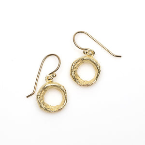 Side view of Organic Donut Earrings by Betsy Barron in 18k yellow gold.