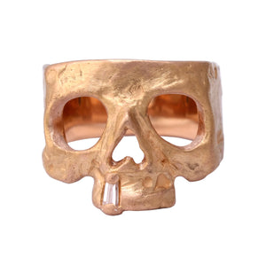 
            
                Load image into Gallery viewer, Front view of 18k yellow gold skull ring by Polly Wales.
            
        