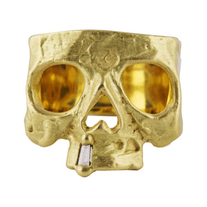 Front view of 18k yellow gold Skull Ring with Diamond Snaggletooth by Polly Wales